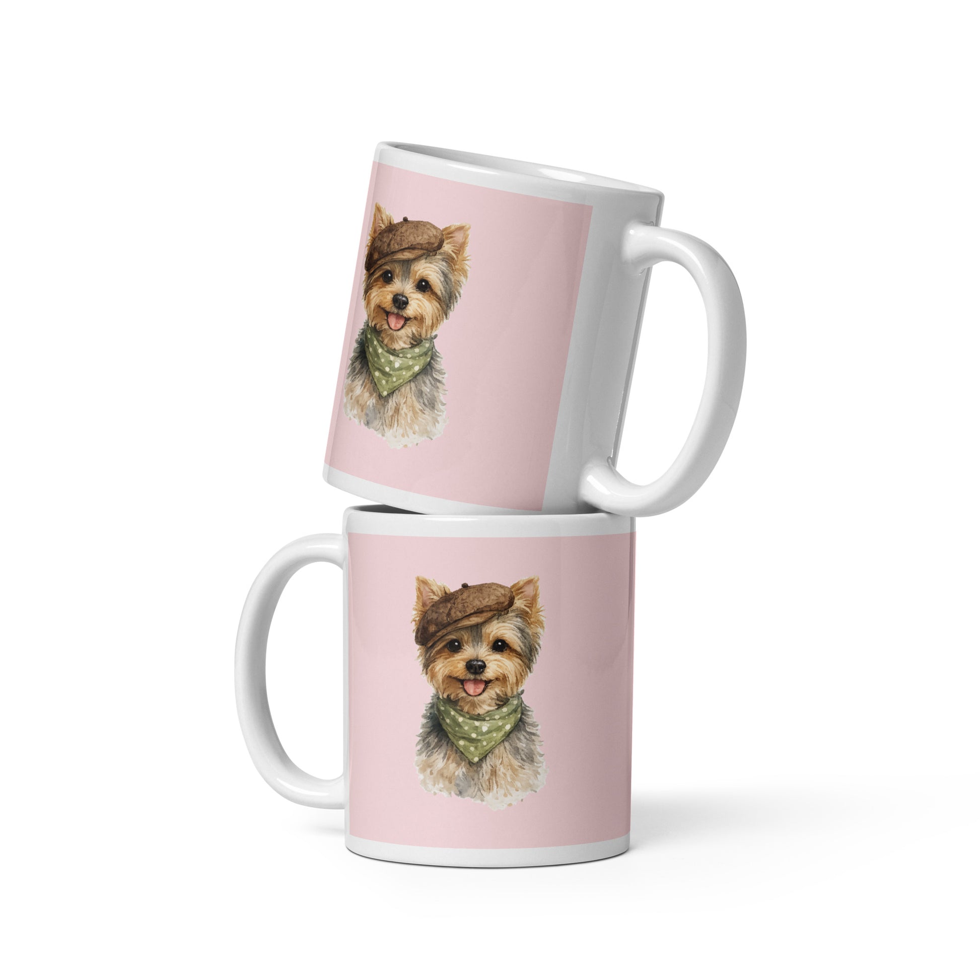 Weiße Keramiktasse mit rosa Hintergrund und Illustration eines Yorkshire Terriers mit Mütze & Halstuch.