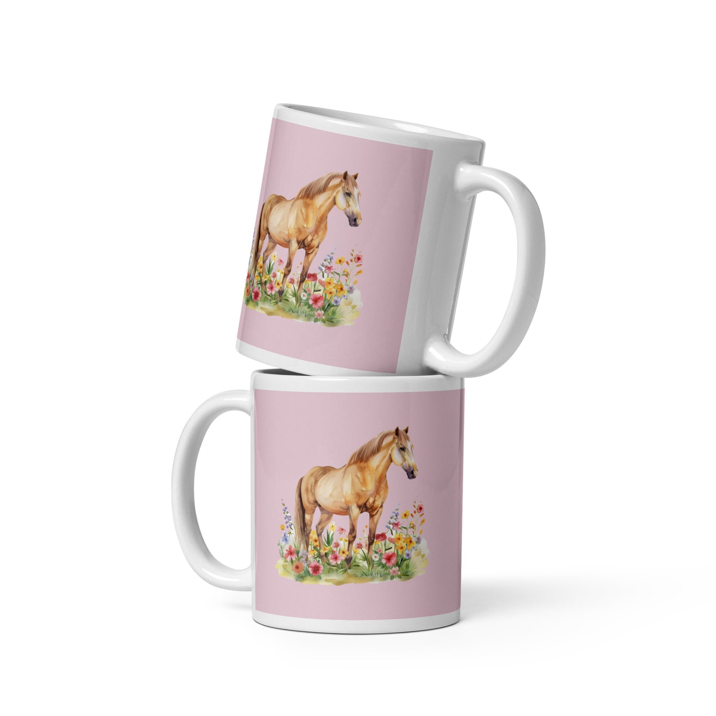 Weiße Keramiktasse mit rosa Hintergrund und Illustration eines Pferdes zwischen bunten Blumen.